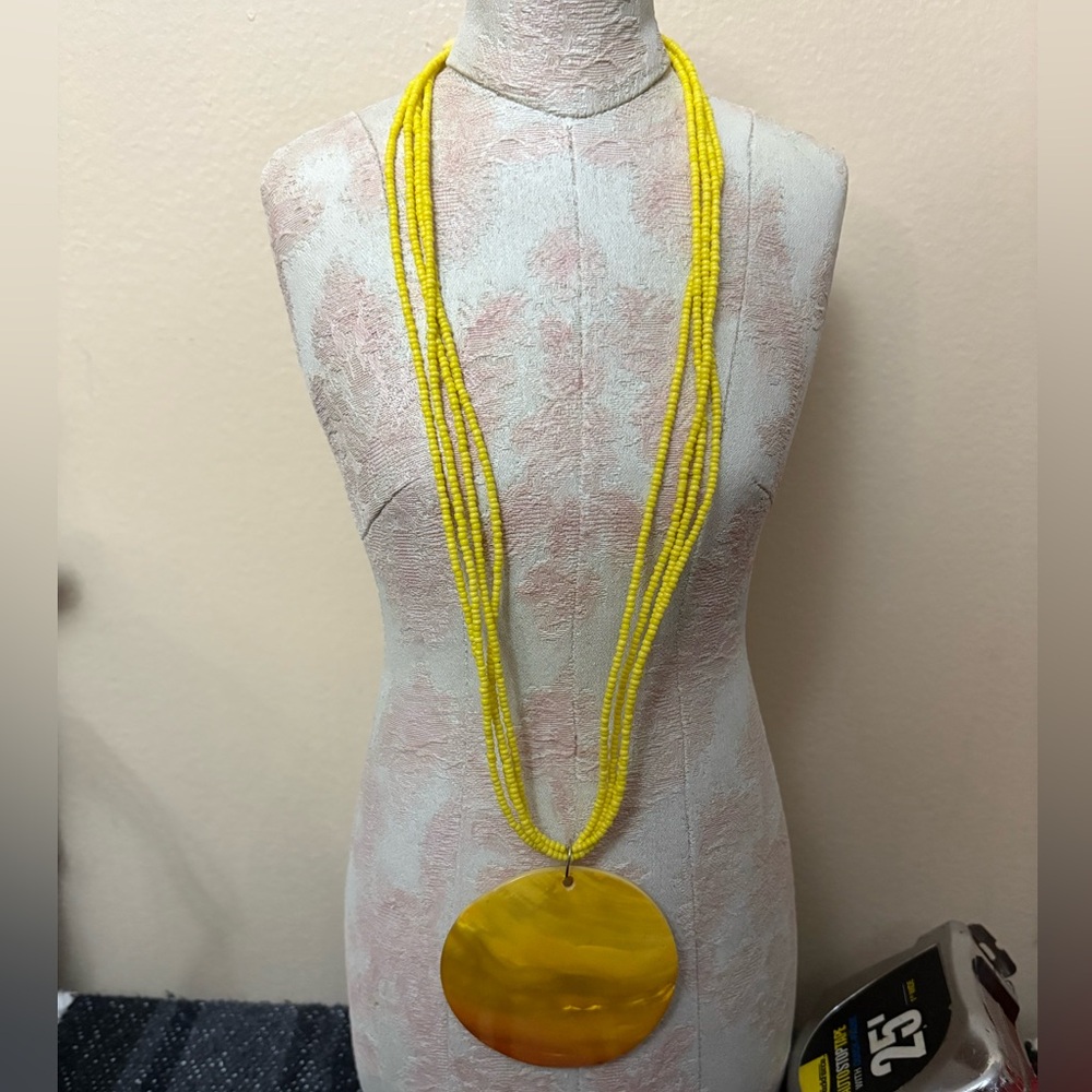 Yellow Beaded Necklace with Large shell Pendant and earrings